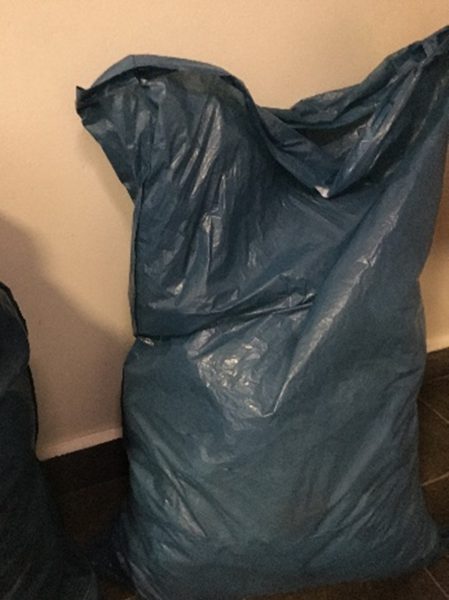 A filled trash bag