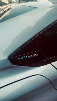 A close-up of the Hybrid sign of the Peugeot 508 plug-in - Hybrid car